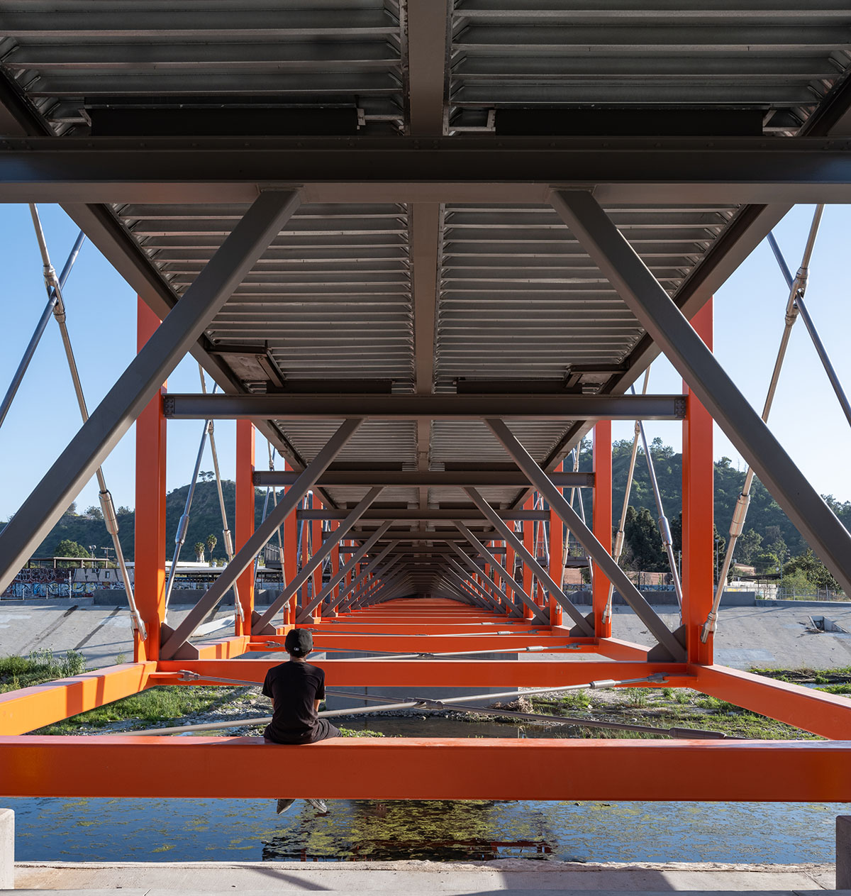 SPF:architects completes bicycle and pedestrian bridge with orange steel boxes on Los Angeles river  