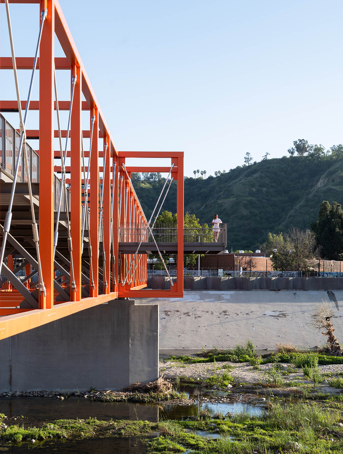 SPF:architects completes bicycle and pedestrian bridge with orange steel boxes on Los Angeles river  
