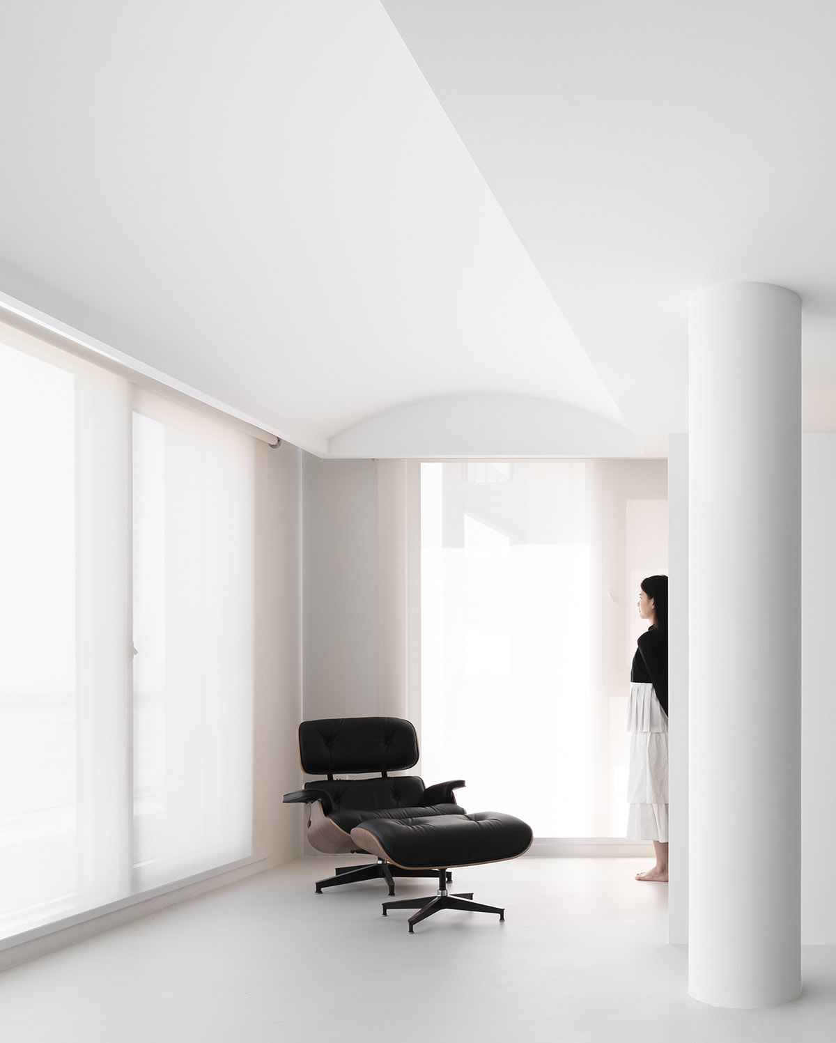 AD ARCHITECTURE creates all-white interiors with geometric compositions for L Apartment in China