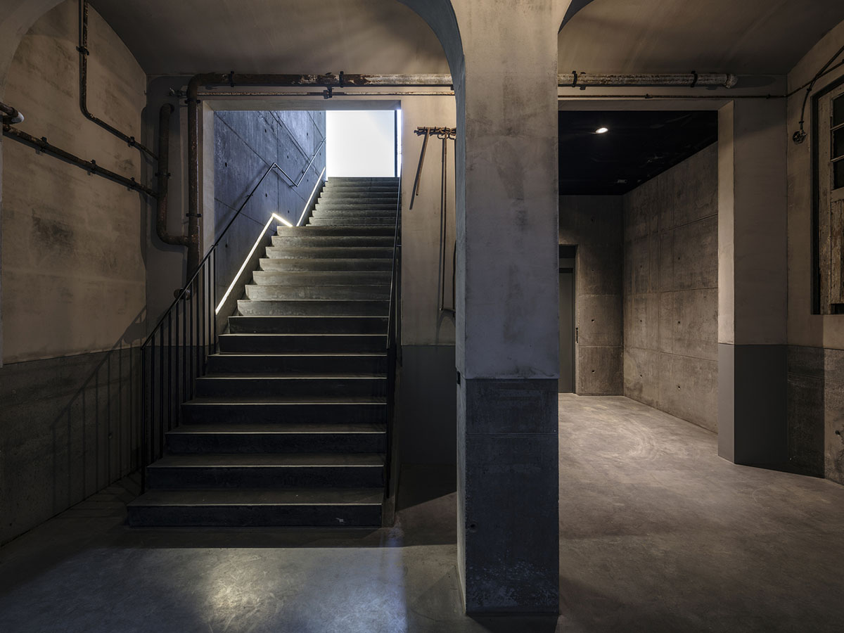 Inbo BV redesigns historic prisoner camp site with reflective pavilion and underground museum