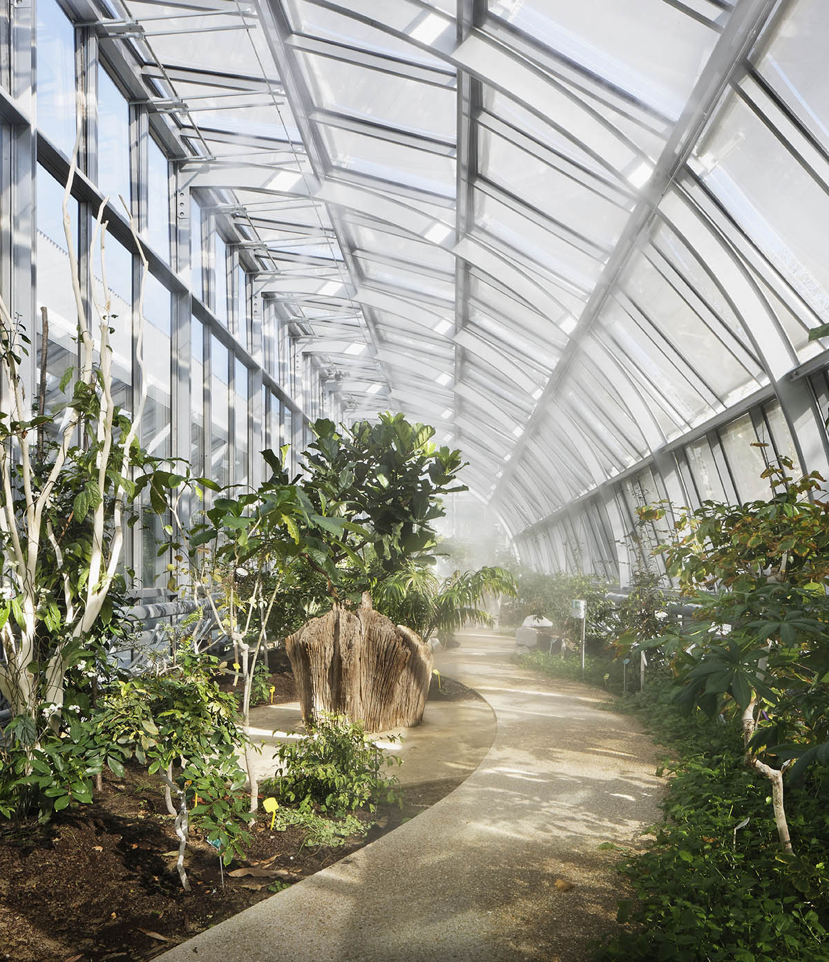 Marc Mimram built greenhouses in all sides of a tennis stadium to attract different audiences