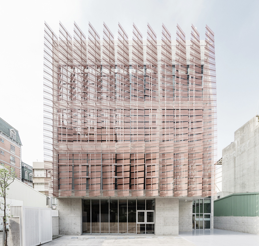 MAYU architects+ adds copper-coloured featherlike screen to main facade of Tung-Men Holiness Church