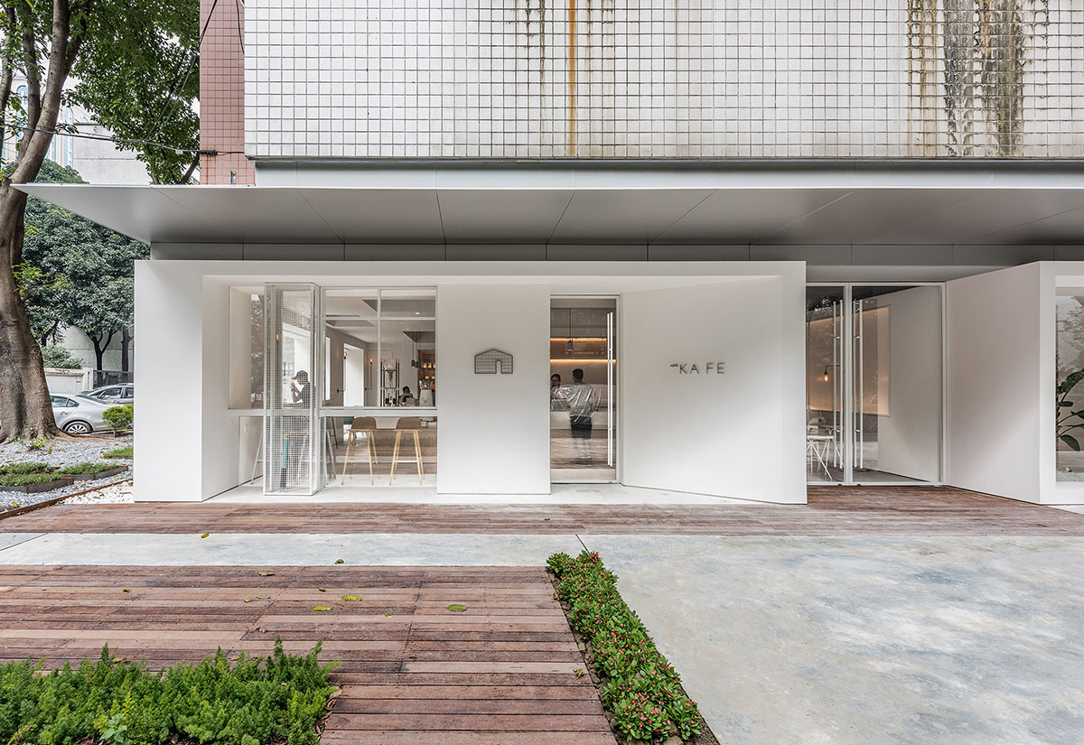 Lukstudio plays with cut-out volumes to transform old Chinese building into cafe and office
