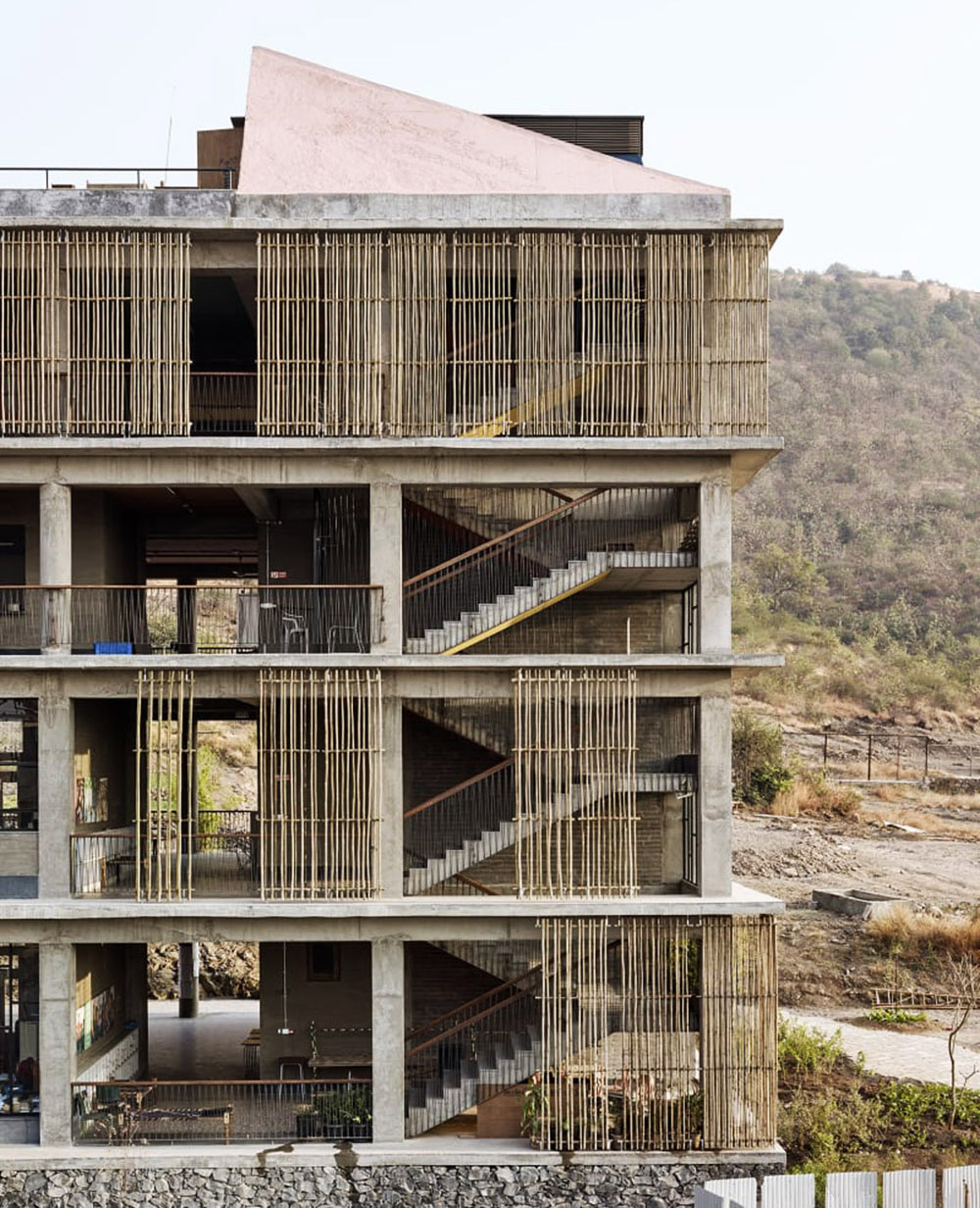 Avasara Academy, resembling an unfinished structure, educates young women in the moorland of Pune