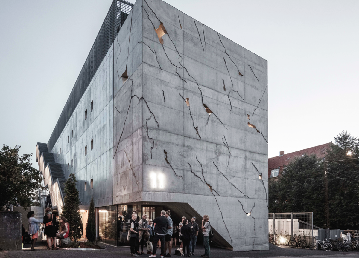 A collage of elements reflecting surroundings assembled on the facade of Office Building by SLETH