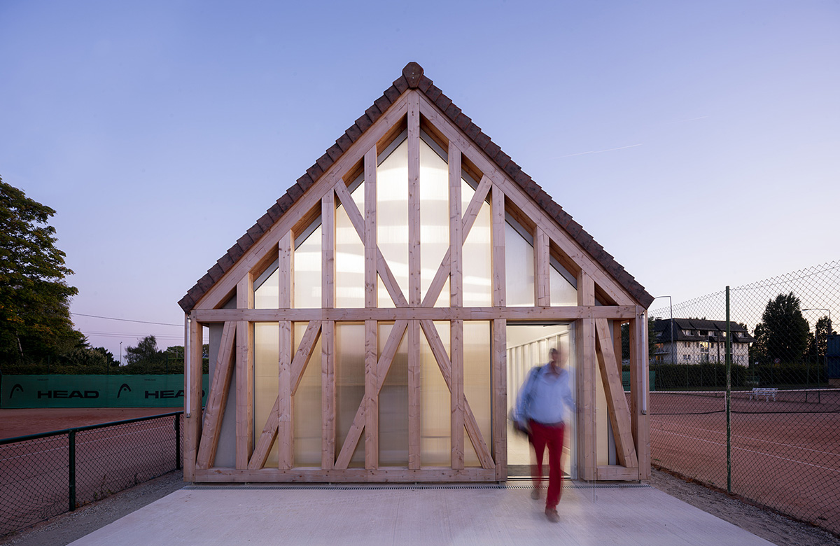 Lemoal Lemoal Architectes wraps tennis club with half-timbered facade elements in Cabourg