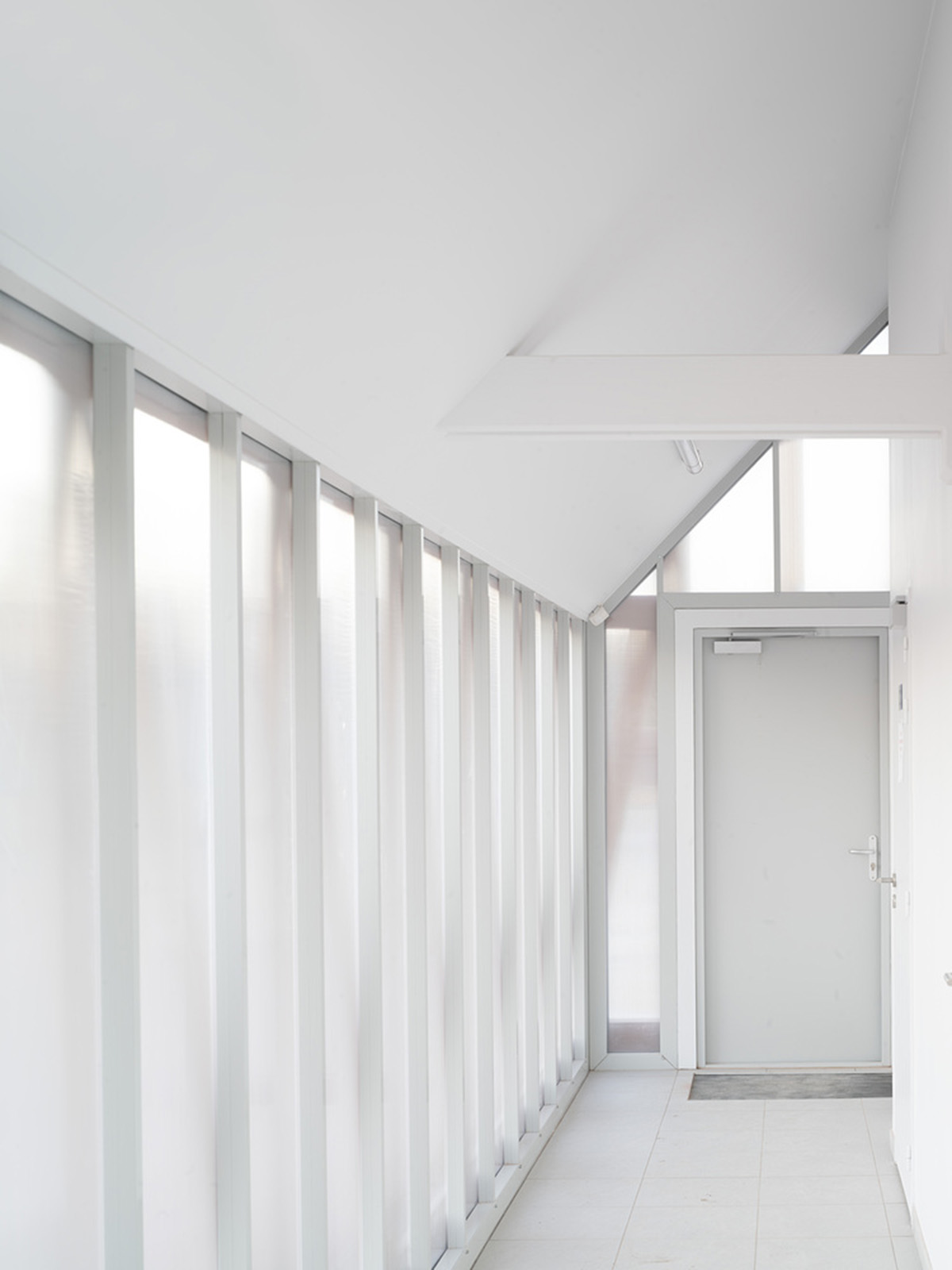 Lemoal Lemoal Architectes wraps tennis club with half-timbered facade elements in Cabourg