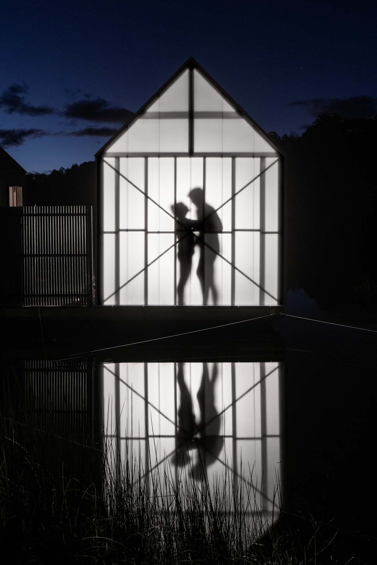 Licht Architecture built a floating sauna with black and white volumes on Tasmanian's Derby Lake