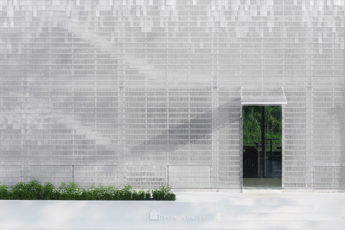 Department of Architecture wraps this small hotel with shimmering facade in Thailand