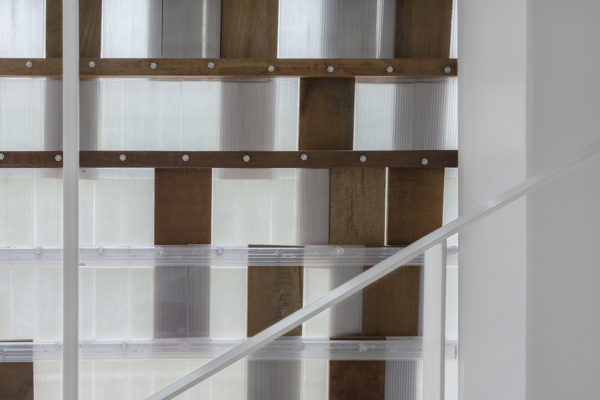 Department of Architecture wraps this small hotel with shimmering facade in Thailand