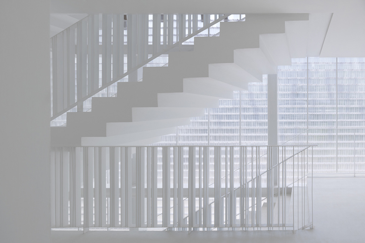 Department of Architecture wraps this small hotel with shimmering facade in Thailand