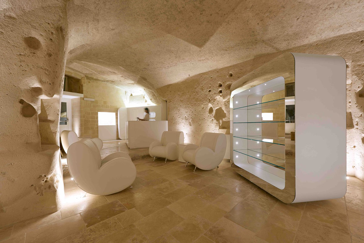 Interiors of this cave hotel and spa by Simone Micheli act like work of art with excavated surfaces