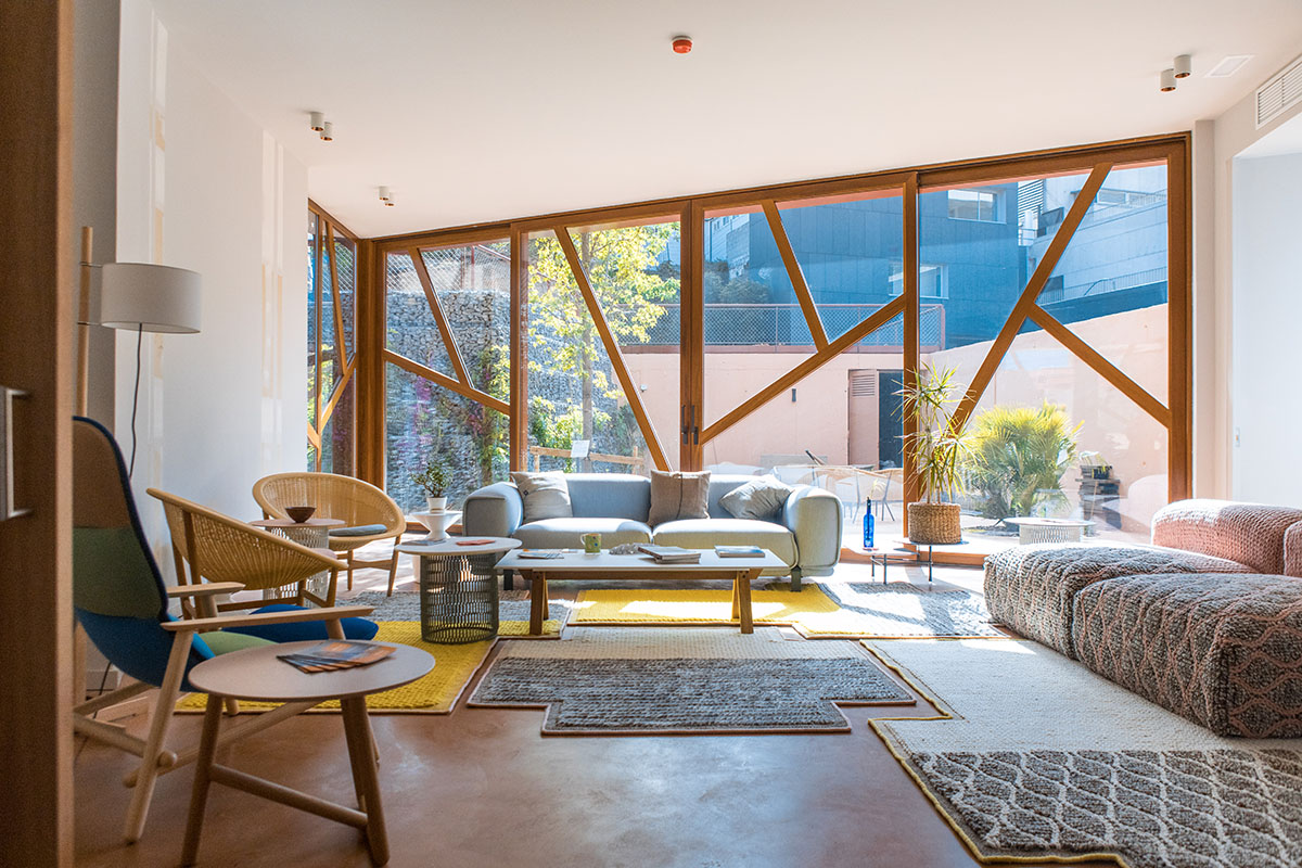 Miralles Tagliabue EMBT completes Maggie's new caring center with textured brick facade in Barcelona