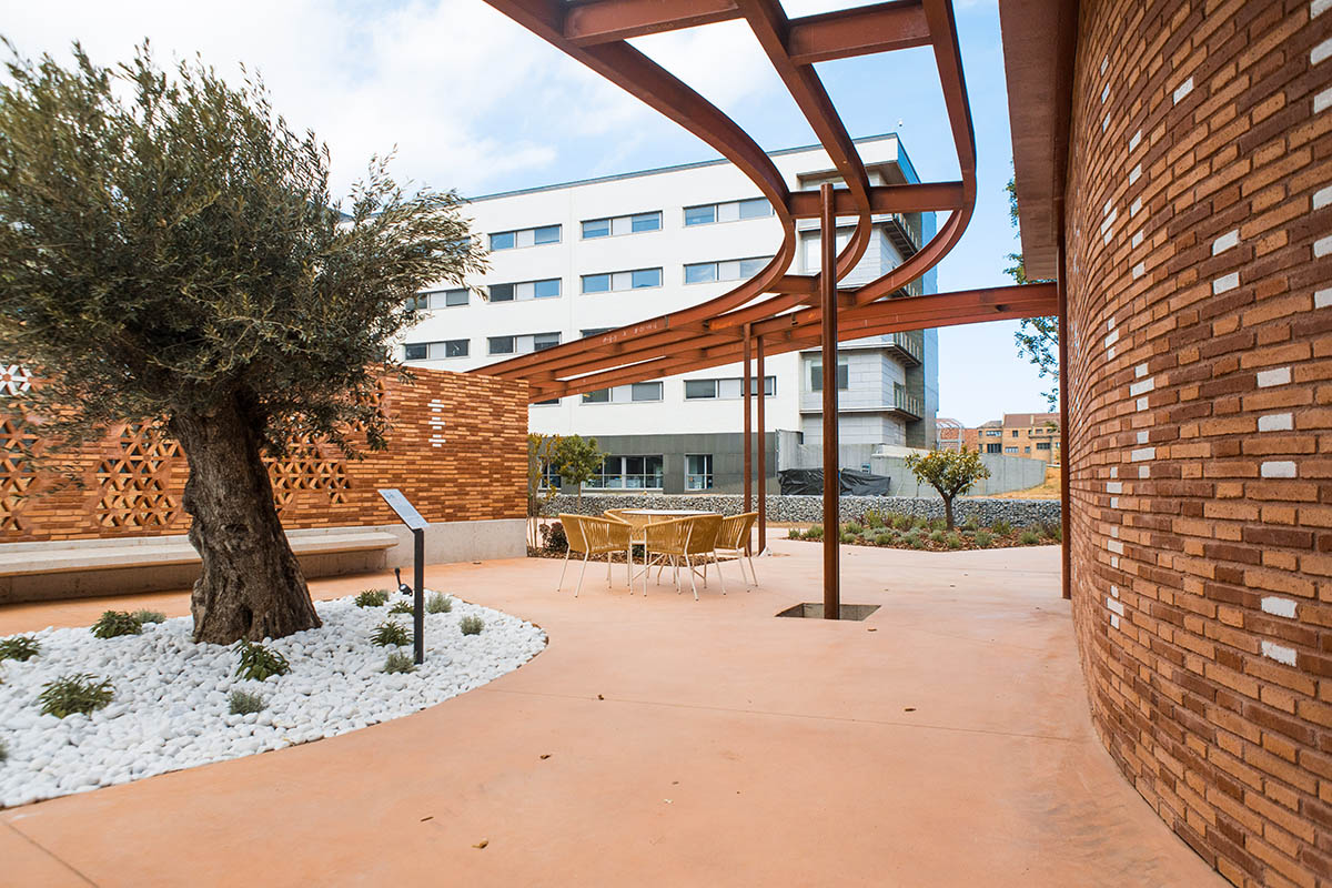 Miralles Tagliabue EMBT completes Maggie's new caring center with textured brick facade in Barcelona