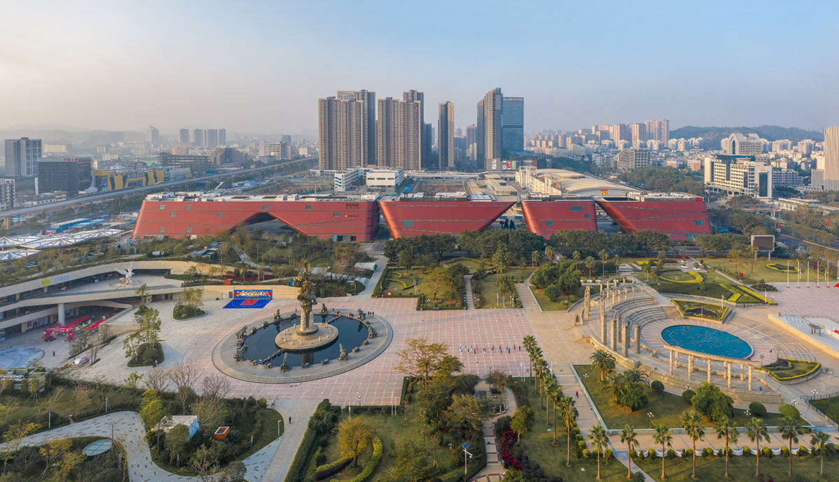 Mecanoo's Cultural Centre in Shenzhen acts as monolithic urban connector with tilted facades