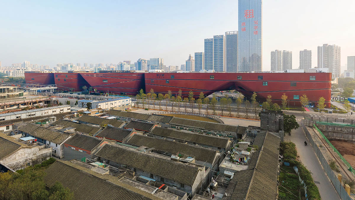 Mecanoo's Cultural Centre in Shenzhen acts as monolithic urban connector with tilted facades