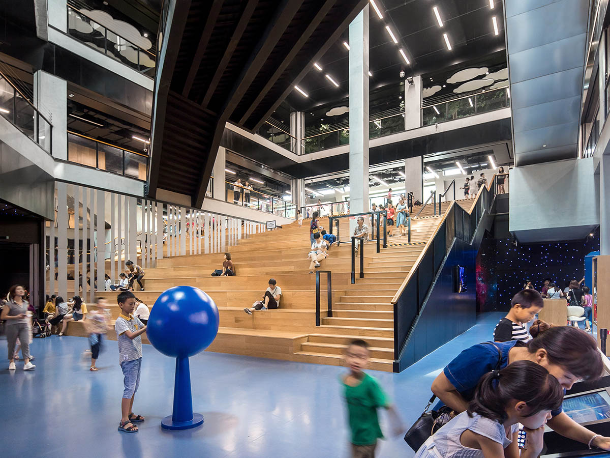 Mecanoo's Cultural Centre in Shenzhen acts as monolithic urban connector with tilted facades