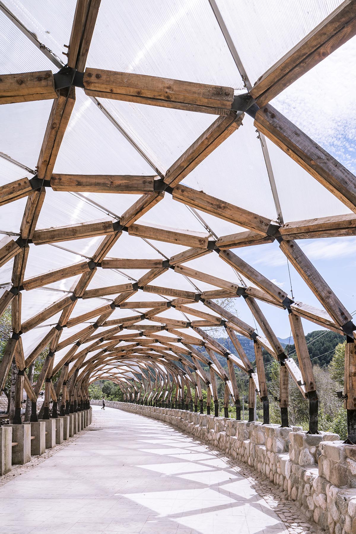 LUO studio Reused Wood Waste from Old Village Houses to Create a Pergola Structure in Hebei, China