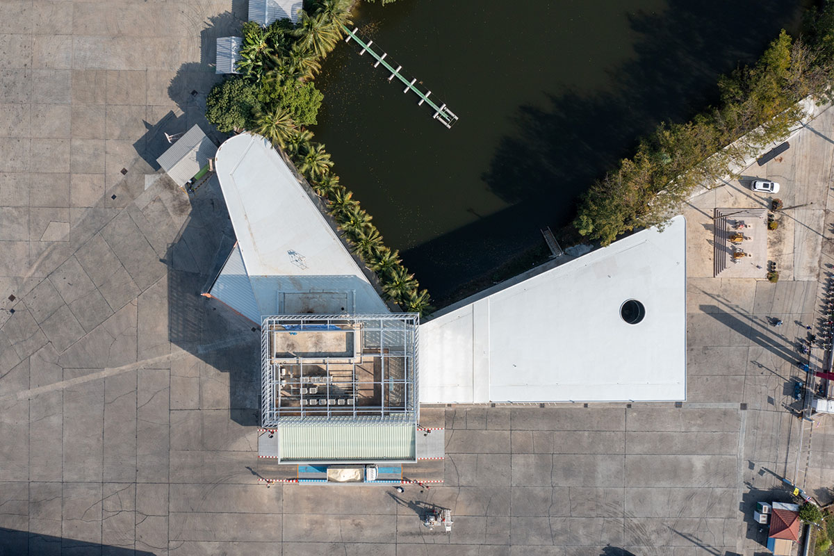 PHTAA living design completes Lorpoonphol Rice Mill Office featuring zig-zag brick wall in Thailand