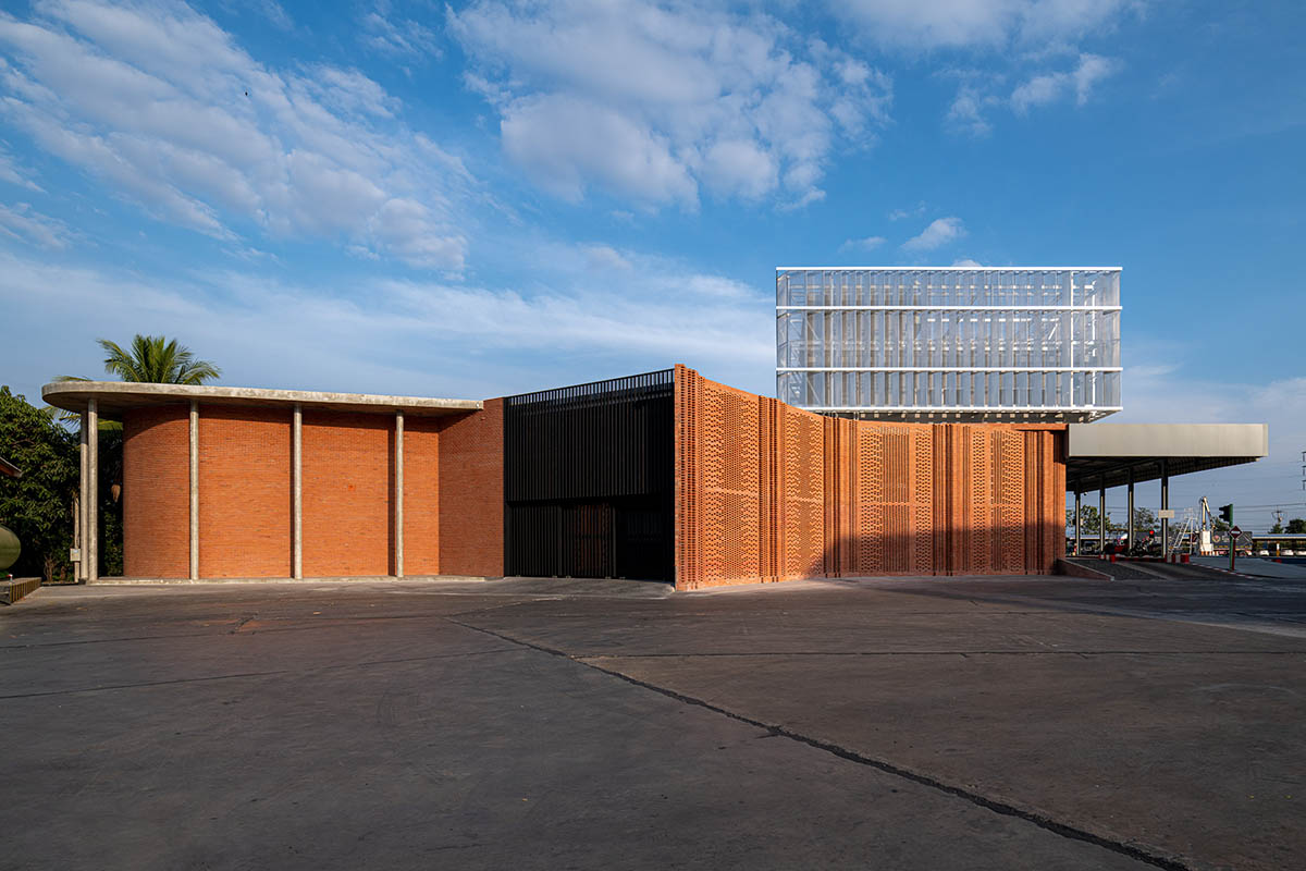 PHTAA living design completes Lorpoonphol Rice Mill Office featuring zig-zag brick wall in Thailand