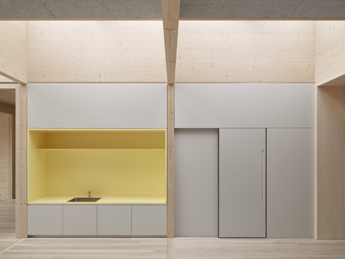 Innauer-Matt Architekten designs kindergarten with large pointed windows and wall motifs in Austria