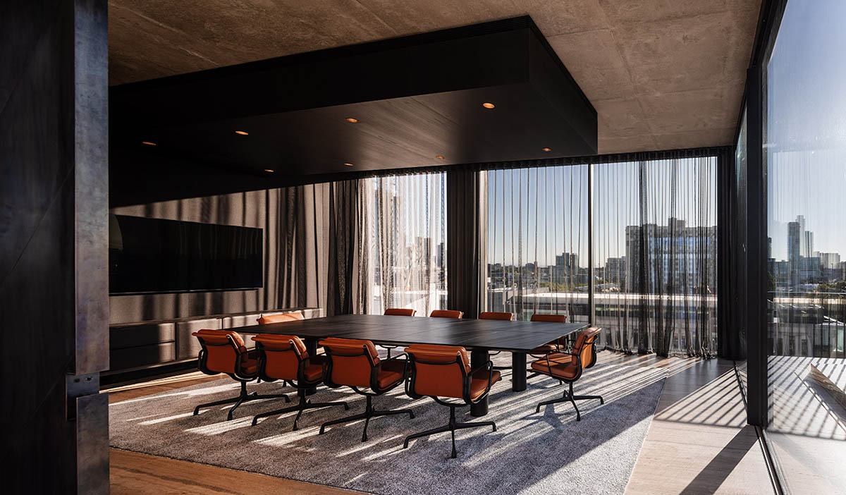 Piccolo House by Wood Marsh features coloured reflective glass elements in South Melbourne