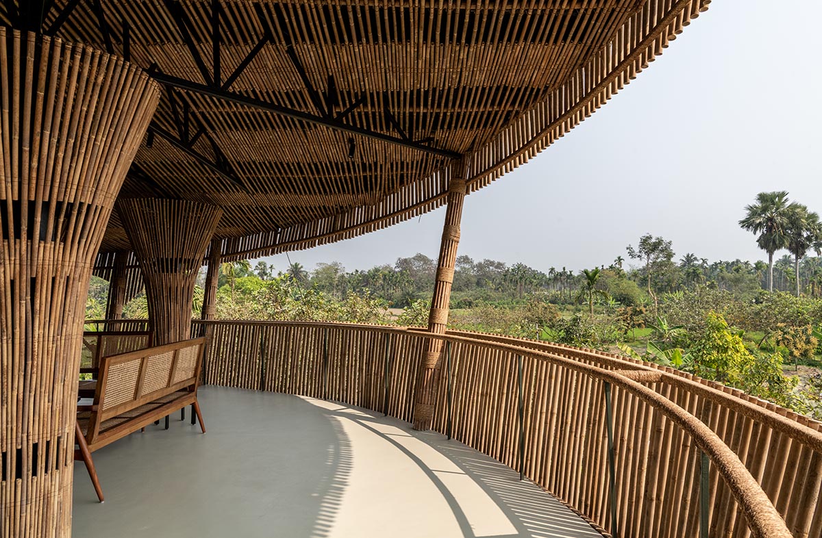 Elevated bamboo weekend retreat by Abin Design Studio captures tranquil views in rural farmland 