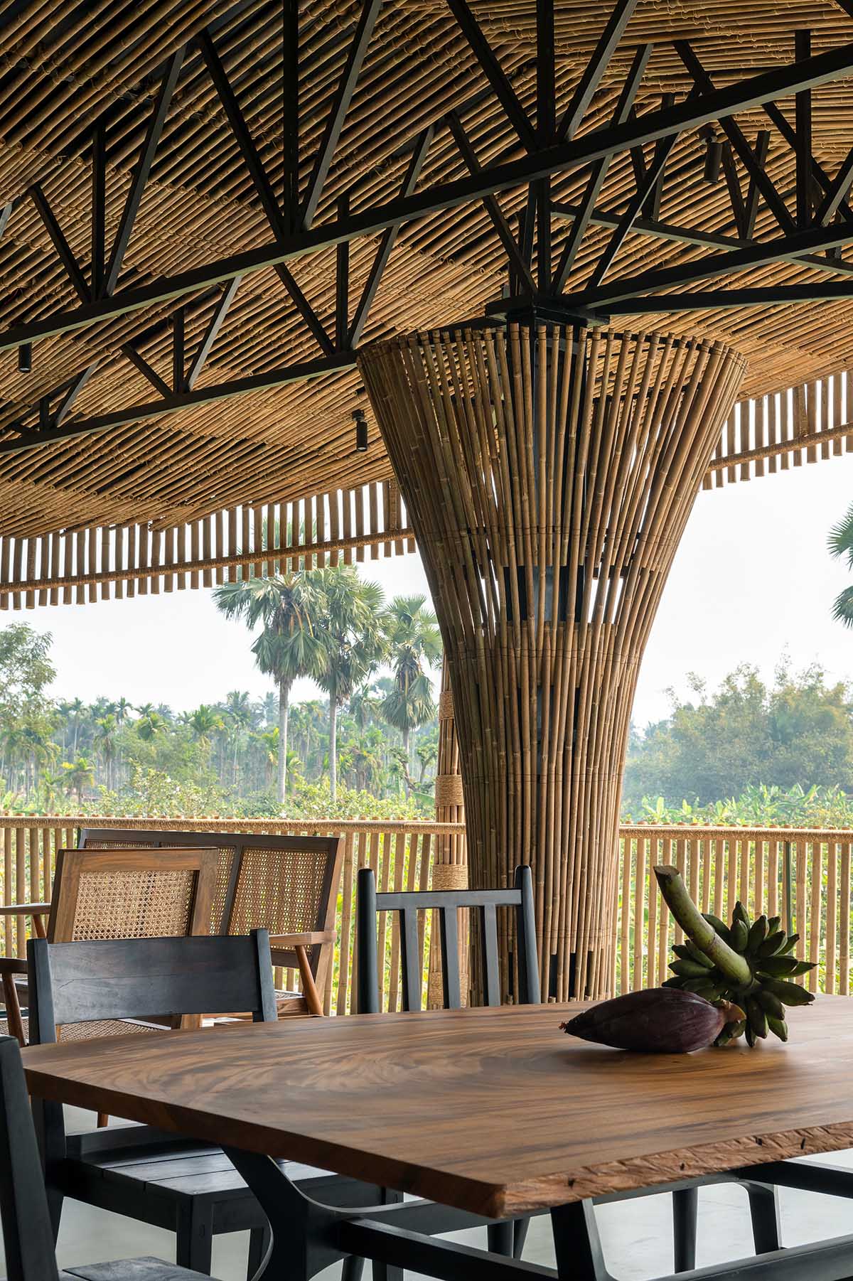Elevated bamboo weekend retreat by Abin Design Studio captures tranquil views in rural farmland 
