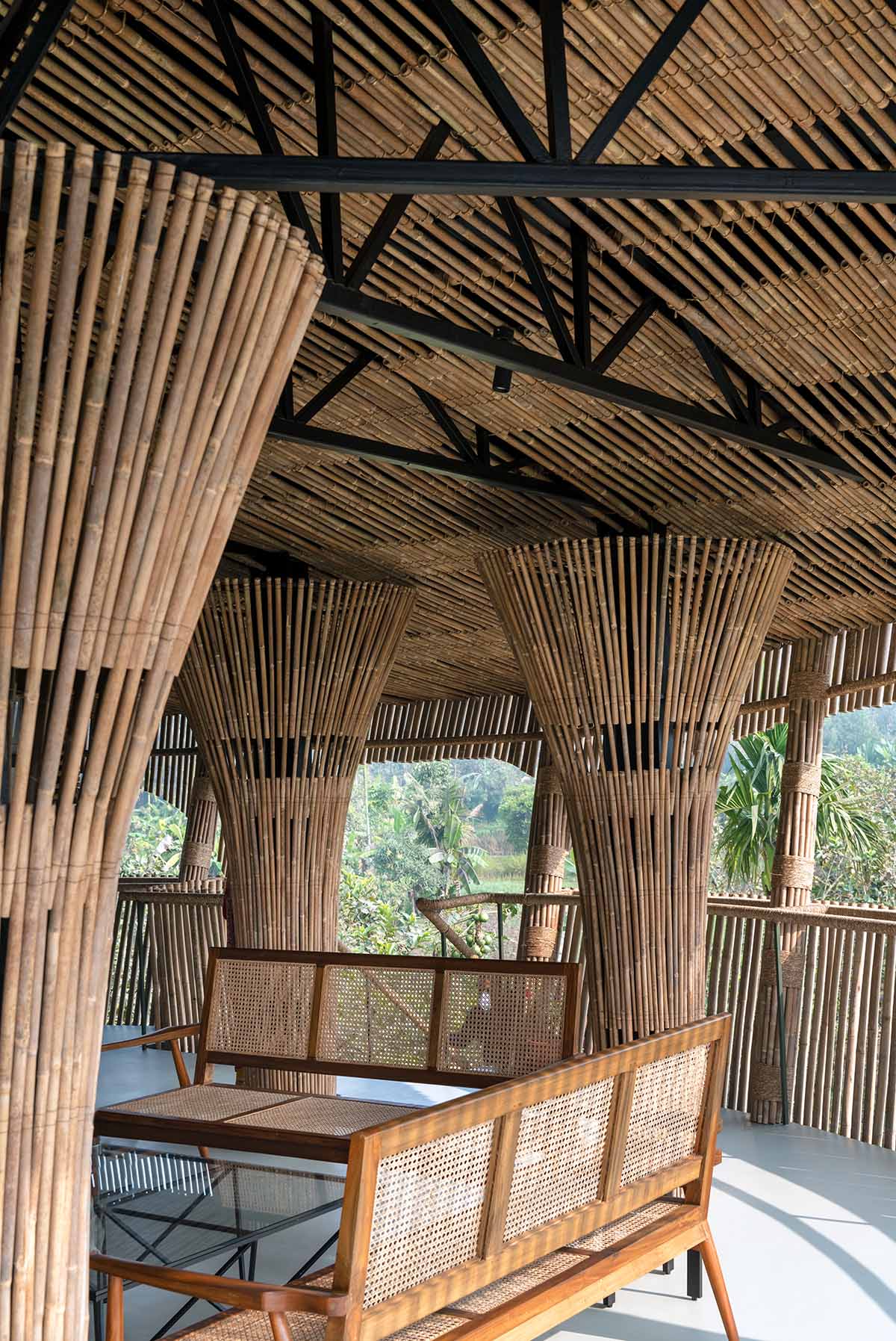 Elevated bamboo weekend retreat by Abin Design Studio captures tranquil views in rural farmland 