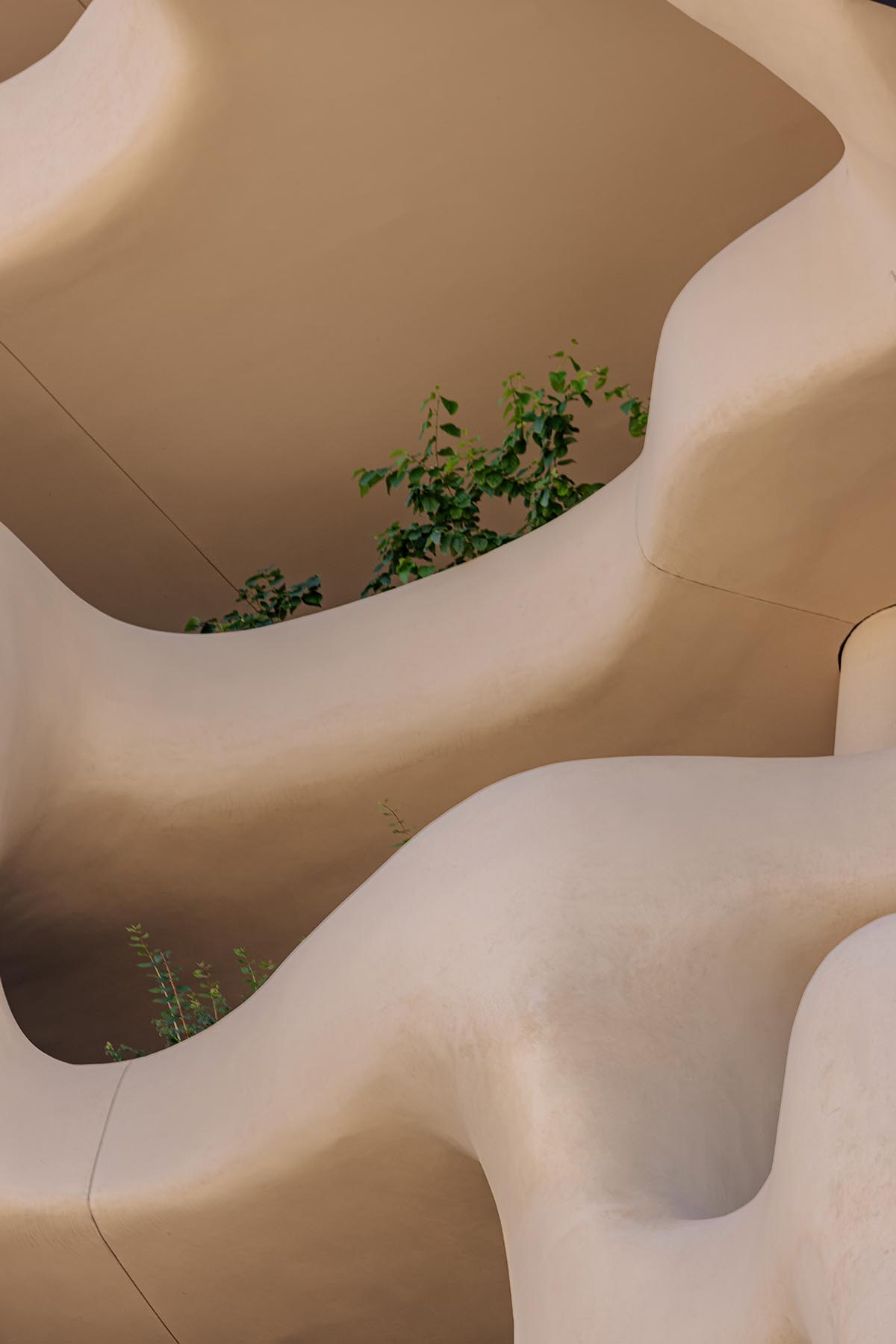 MAD reveals mixed-use tower that features a cracked-open canyon in the heart of Denver