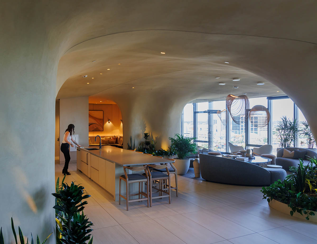 MAD reveals mixed-use tower that features a cracked-open canyon in the heart of Denver