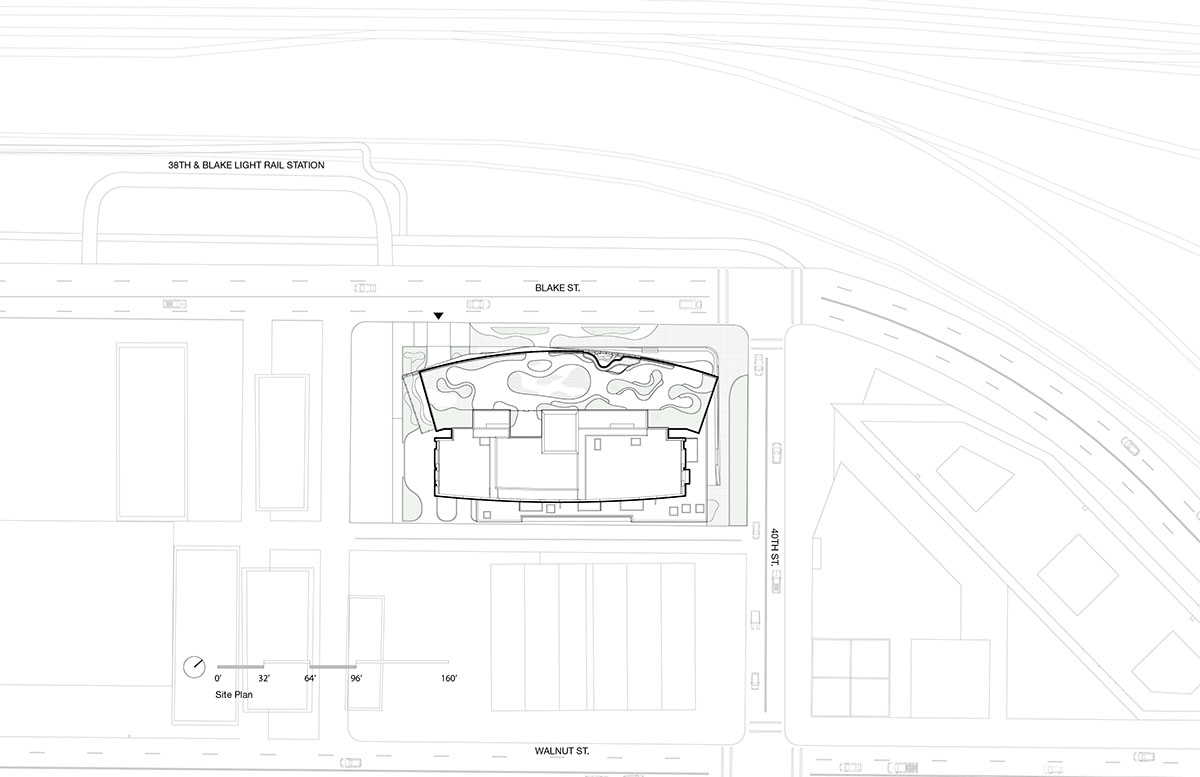 MAD reveals mixed-use tower that features a cracked-open canyon in the heart of Denver