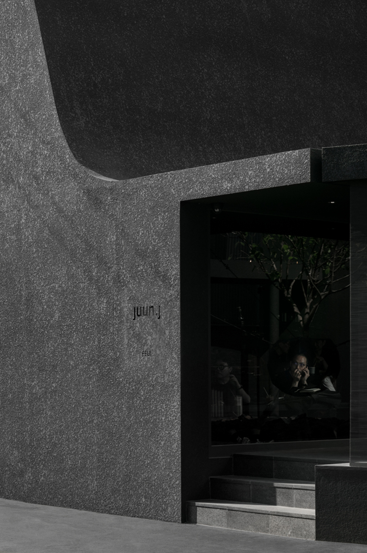 WGNB uses achromatic color of black for partly triangular-designed fashion store in Seoul