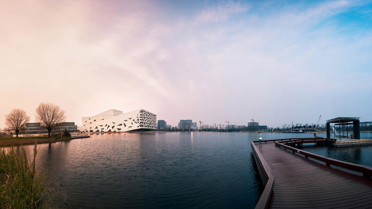Henning Larsen Architects completes opera house featuring ice cracking elements on façade in Yuhang