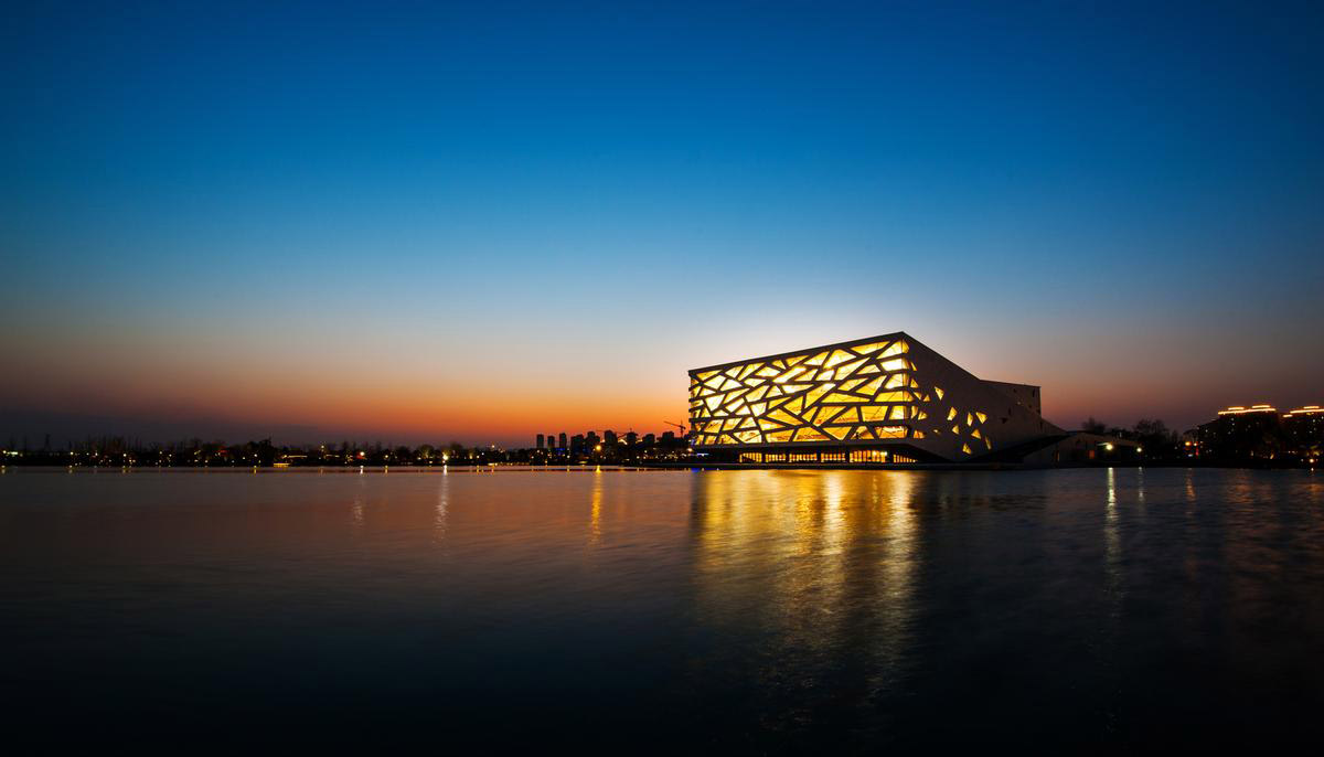 Henning Larsen Architects completes opera house featuring ice cracking elements on façade in Yuhang