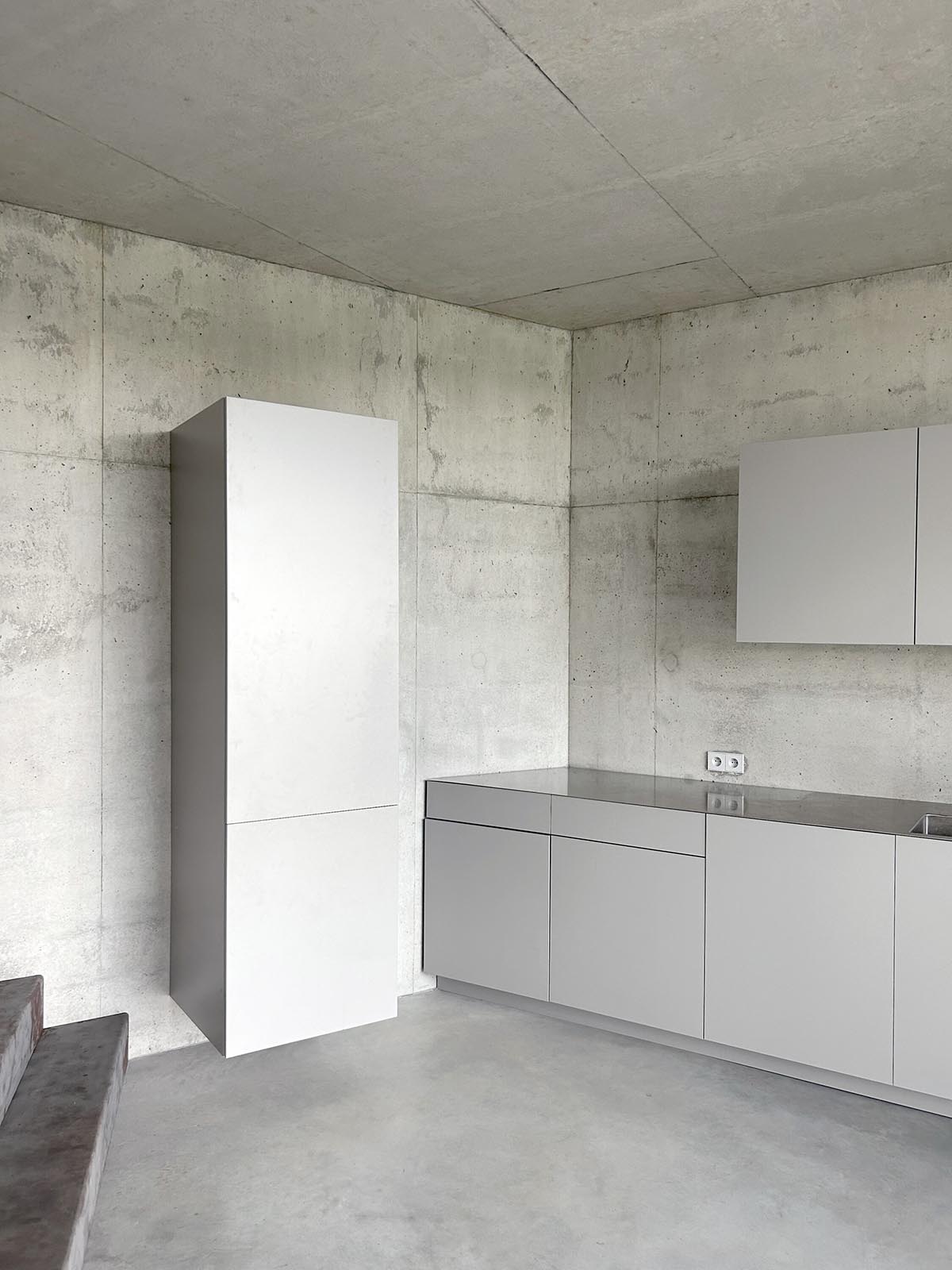 Malý Chmel creates a vertical concrete cave in a sloped garden in the Czech Republic