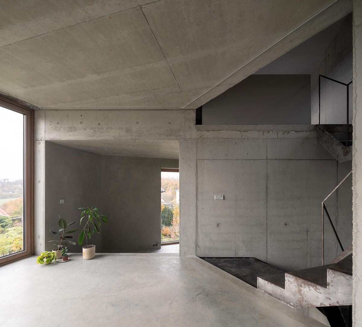 Malý Chmel creates a vertical concrete cave in a sloped garden in the Czech Republic