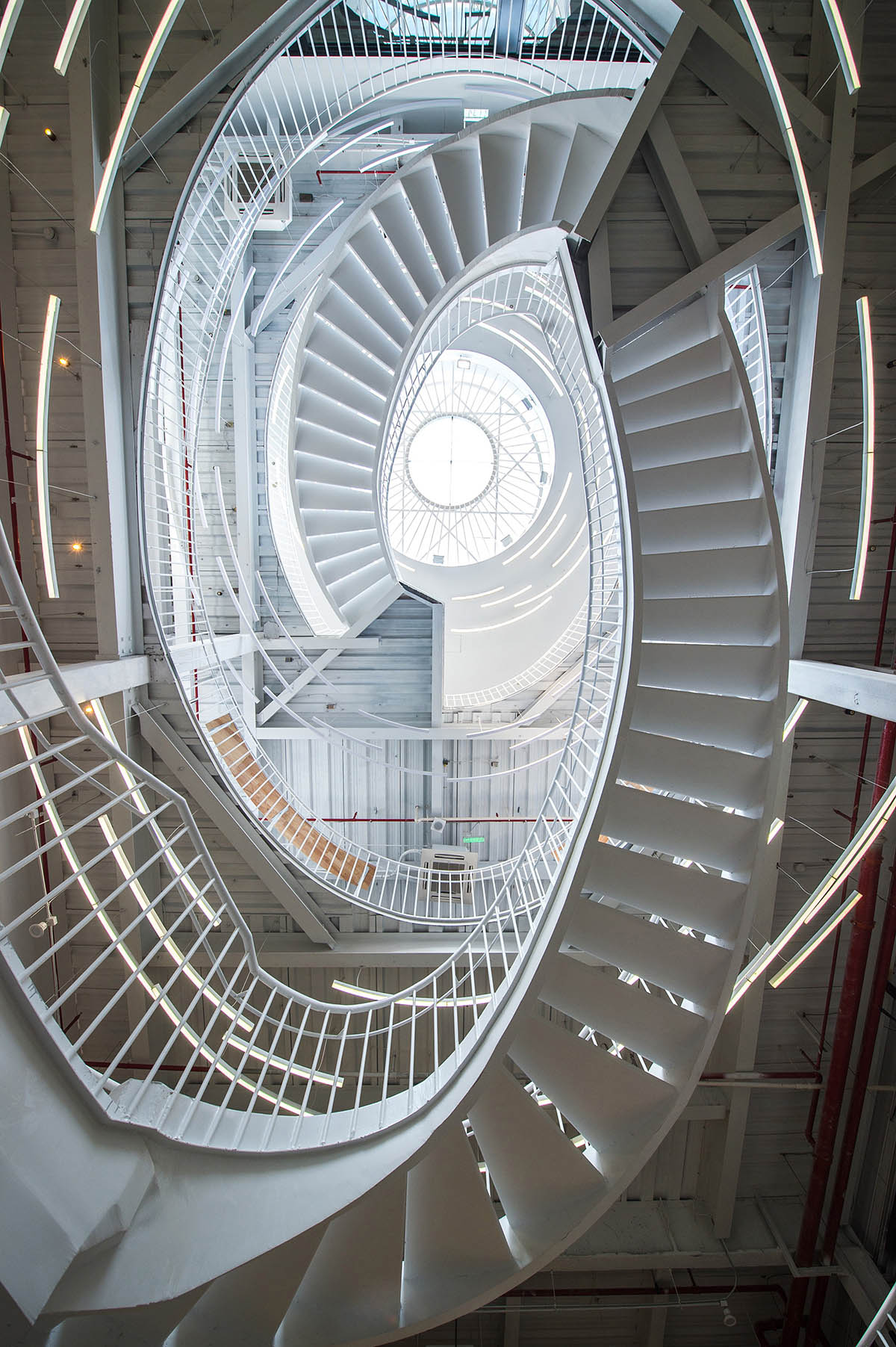 RoarcRenew converted 1980s Warehouse into a Co-working Space with Museum Exhibition Display Design