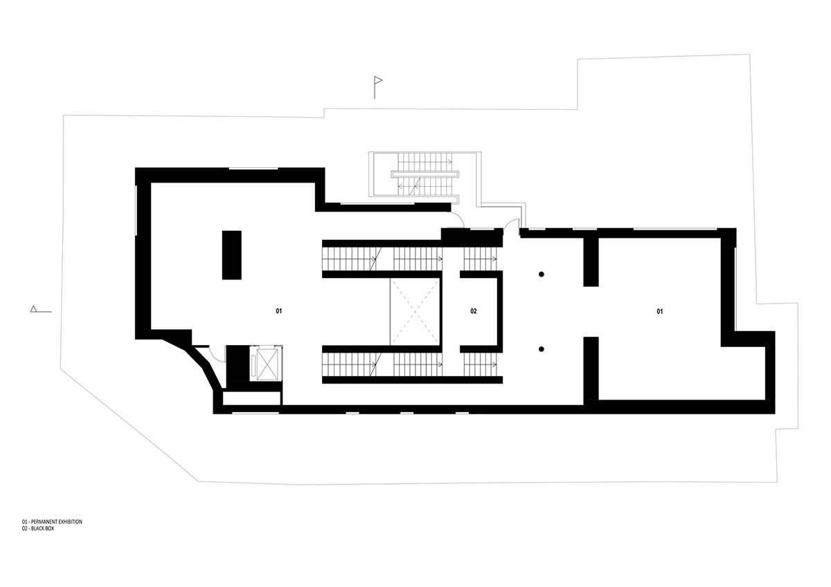 YTAA converts old villa into a museum with irregular dark surfaces and glazed base in Bucharest