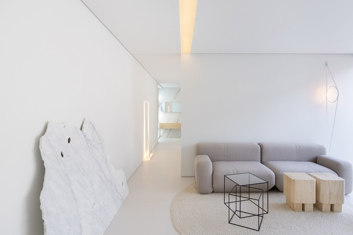 Marilia Pellegrini transforms old shipping containers into a modern micro home with clean finishes