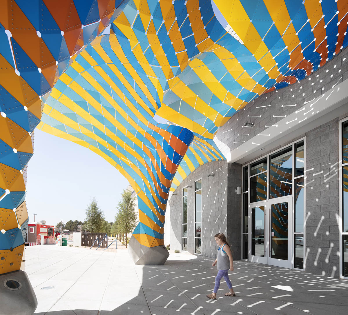 THEVERYMANY adds two-sided sculptural canopy to the entrance of Westside Natatorium in El Paso
