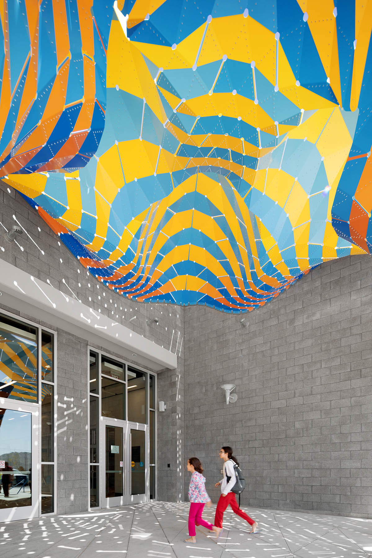 THEVERYMANY adds two-sided sculptural canopy to the entrance of Westside Natatorium in El Paso