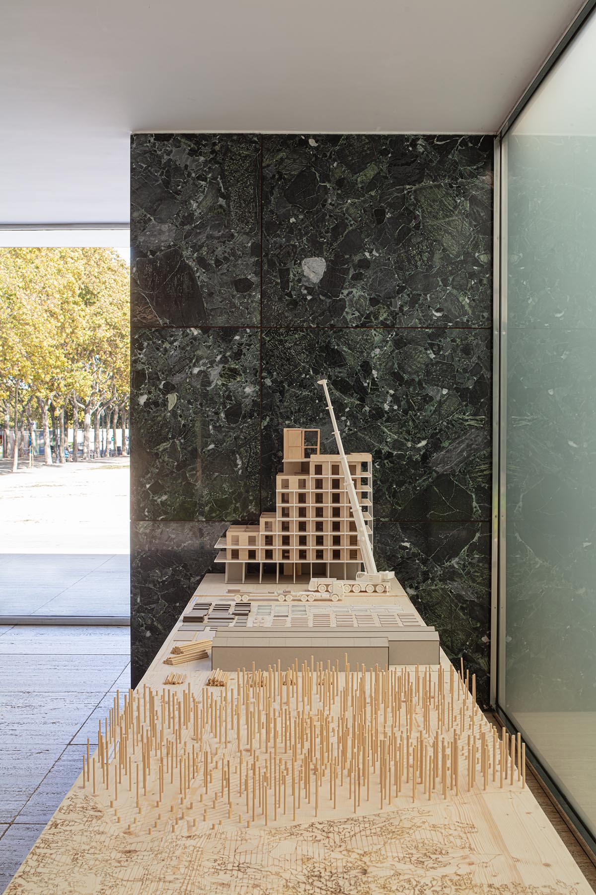 IAAC and Bauhaus Earth add Mass is More timber installation to Mies van der Rohe Pavilion