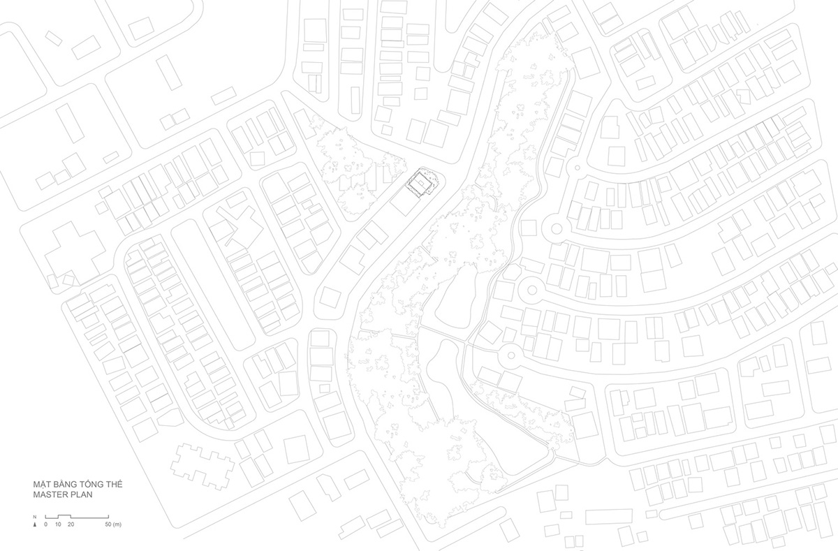 MIA Design Studio created vertical open library inside its office filled with greenery in Vietnam