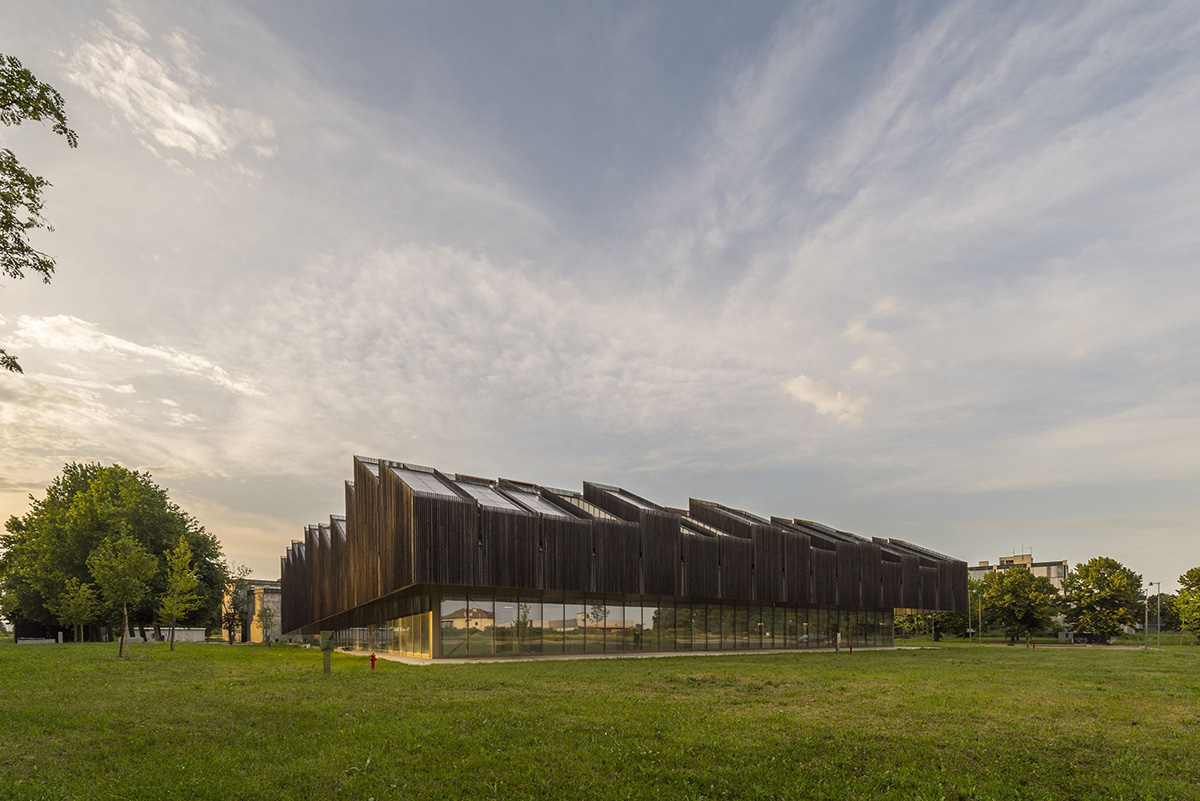 Mario Cucinella Architects designs ARPAE headquarters with chimney-shaped roofs in Ferrara, Italy