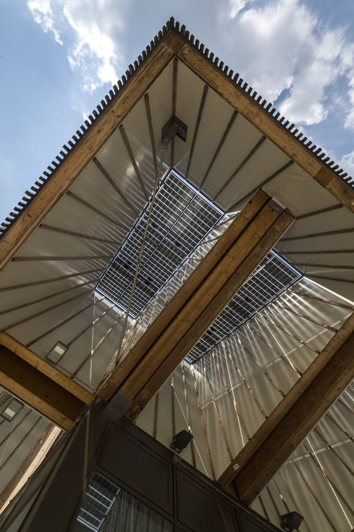 Mario Cucinella Architects designs ARPAE headquarters with chimney-shaped roofs in Ferrara, Italy