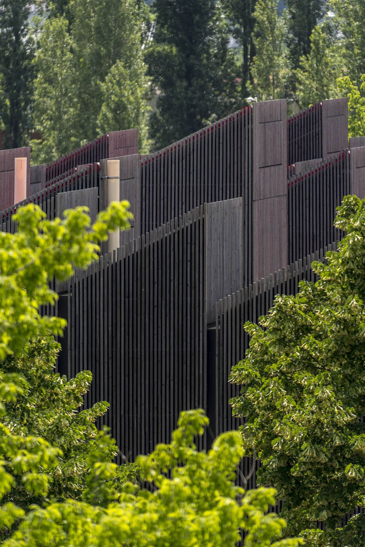 Mario Cucinella Architects designs ARPAE headquarters with chimney-shaped roofs in Ferrara, Italy