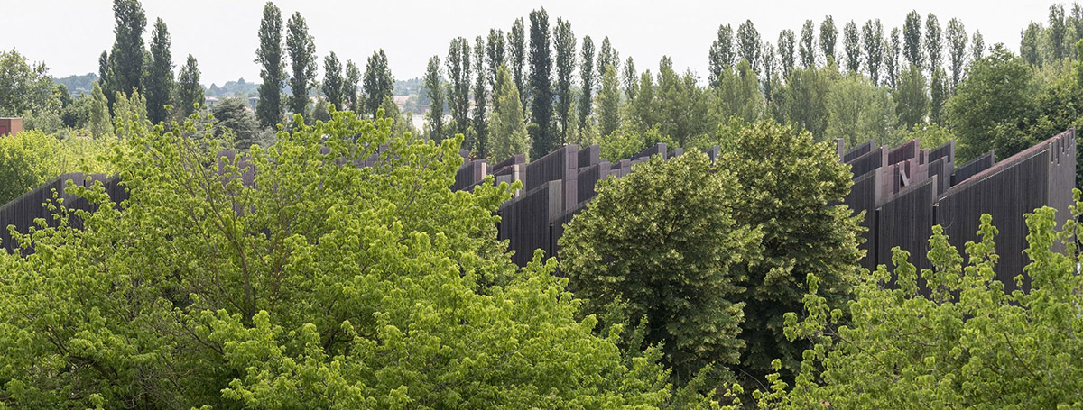 Mario Cucinella Architects designs ARPAE headquarters with chimney-shaped roofs in Ferrara, Italy