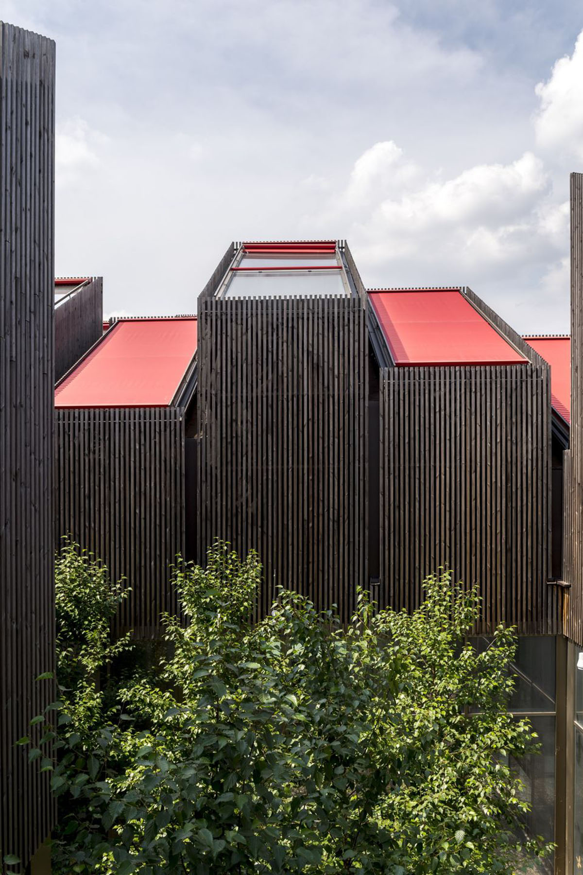 Mario Cucinella Architects designs ARPAE headquarters with chimney-shaped roofs in Ferrara, Italy