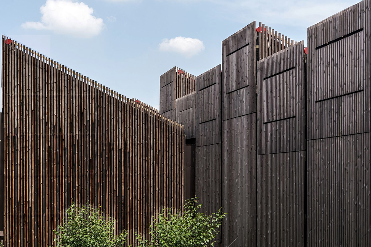 Mario Cucinella Architects designs ARPAE headquarters with chimney-shaped roofs in Ferrara, Italy